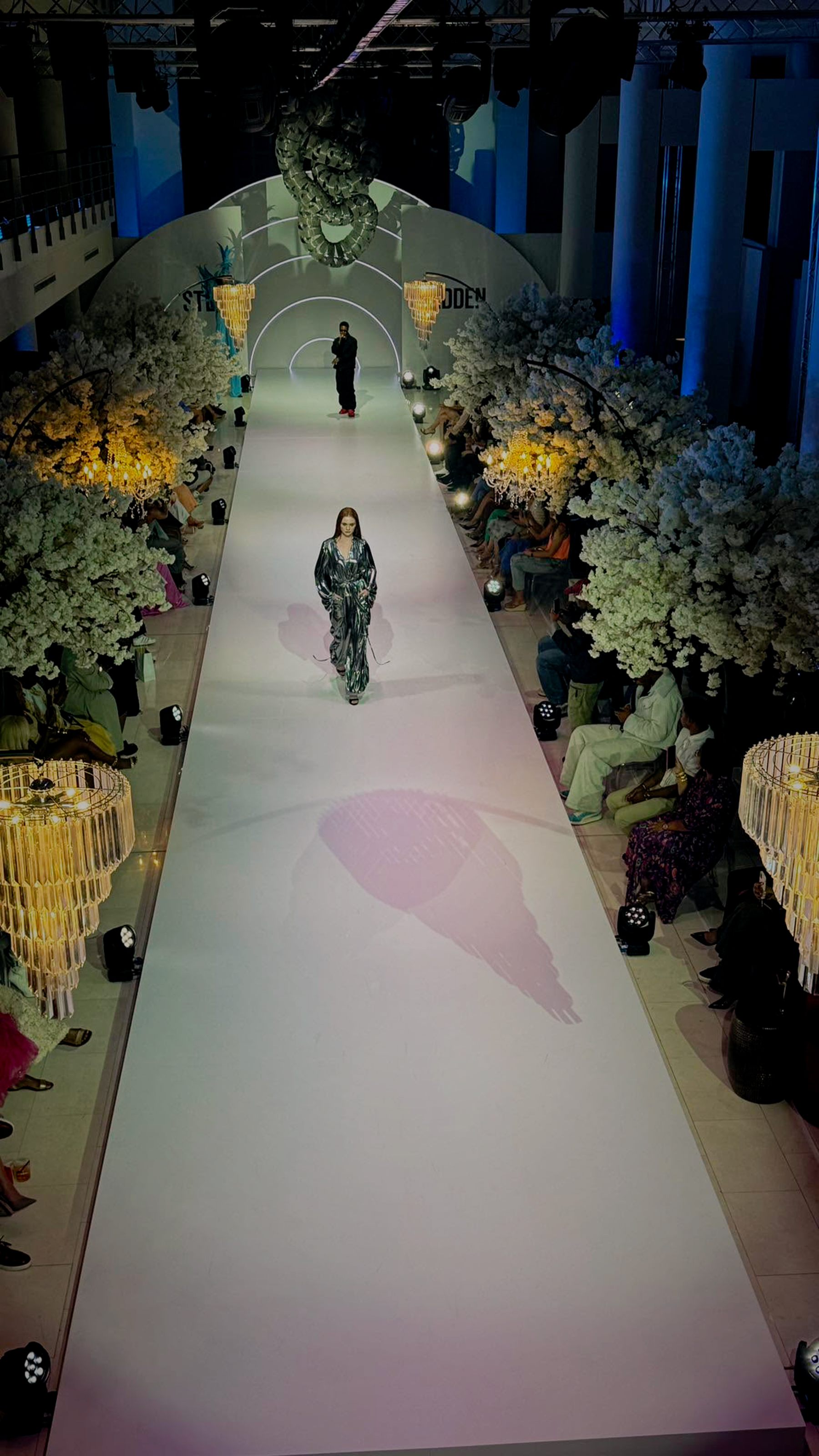 Steve Madden — runway activation with cherry-blossom trees, chandeliers and purple wash